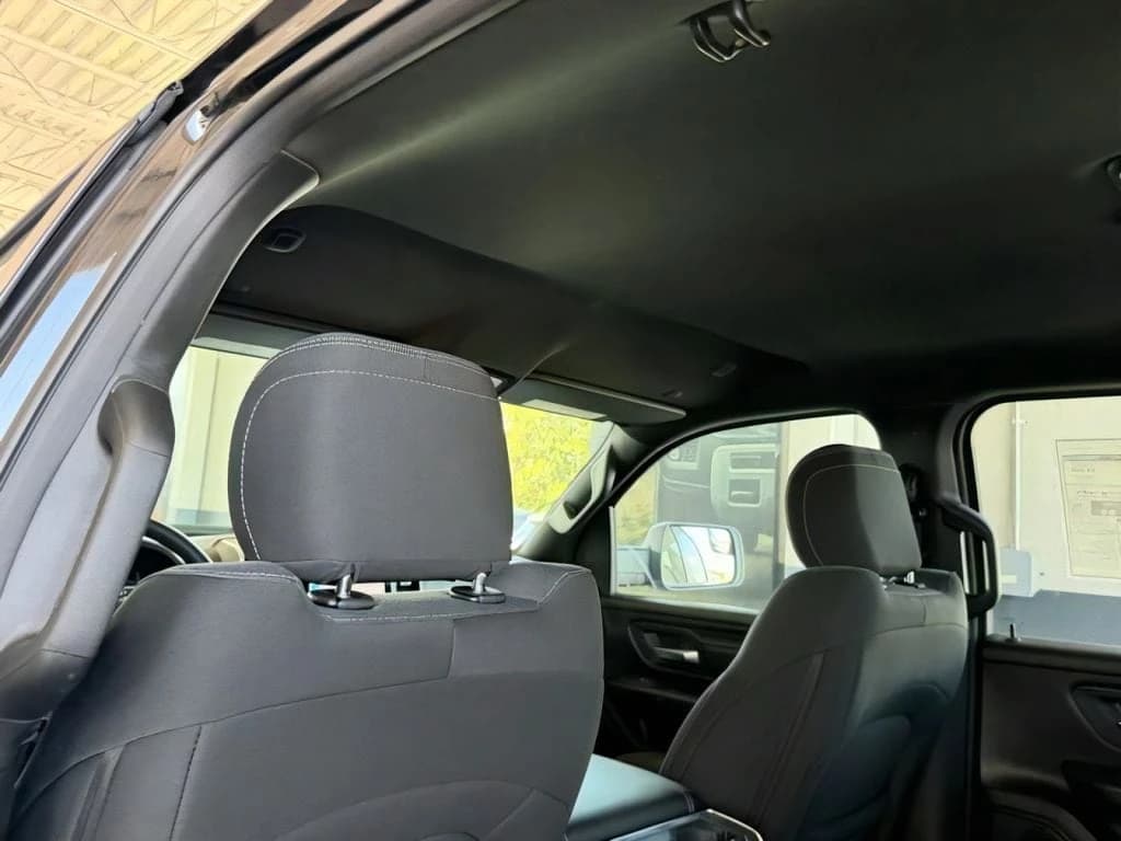 Ram 1500 Express 4x4 Crew Cab 5'7" Box 2026 — side view