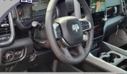 Ram 1500 Laramie 4x4 Crew Cab 5'7" Box 2026 — side view