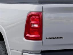 Ram 1500 Laramie 4x4 Crew Cab 5'7" Box 2026 — side view
