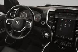 Ram 1500 Laramie 4x4 Crew Cab 5'7" Box 2026 — side view