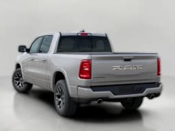 Ram 1500 Laramie 4x4 Crew Cab 5'7" Box 2026 — side view