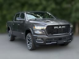 Ram 1500 Laramie 4x4 Crew Cab 5'7" Box 2026 — side view