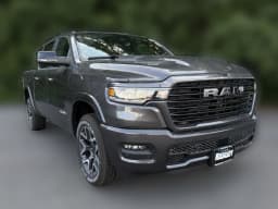 Ram 1500 Laramie 4x4 Crew Cab 5'7" Box 2026 — side view