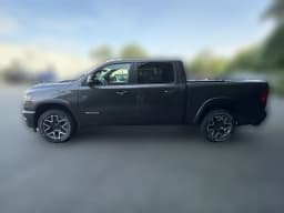 Ram 1500 Laramie 4x4 Crew Cab 5'7" Box 2026 — side view