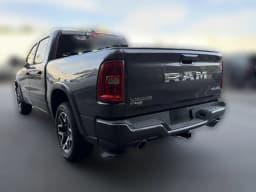 Ram 1500 Laramie 4x4 Crew Cab 5'7" Box 2026 — side view