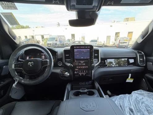 Ram 1500 Laramie 4x4 Crew Cab 5'7" Box 2026 — side view