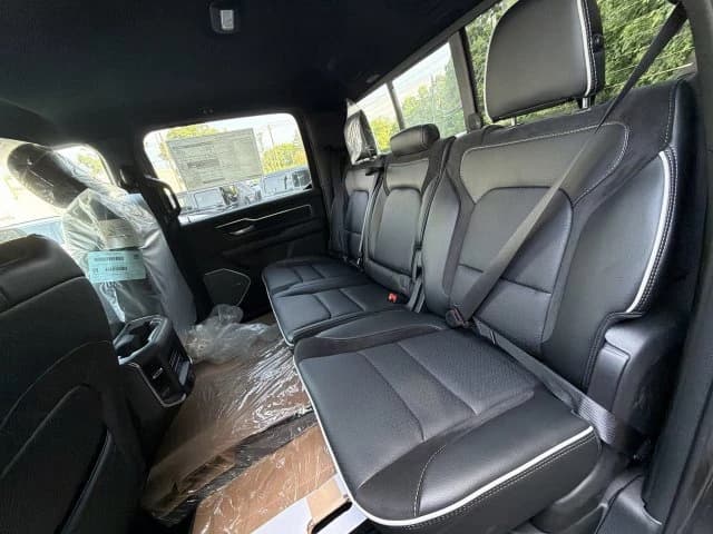 Ram 1500 Laramie 4x4 Crew Cab 5'7" Box 2026 — side view