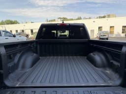 Ram 1500 Laramie 4x4 Crew Cab 5'7" Box 2026 — side view