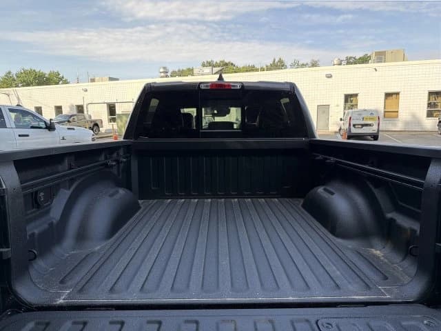 Ram 1500 Laramie 4x4 Crew Cab 5'7" Box 2026 — side view