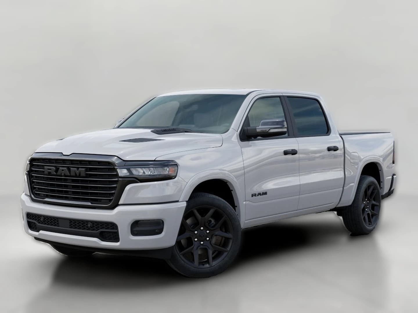 Ram 1500 Laramie 4x4 Crew Cab 5'7" Box 2026 — side view