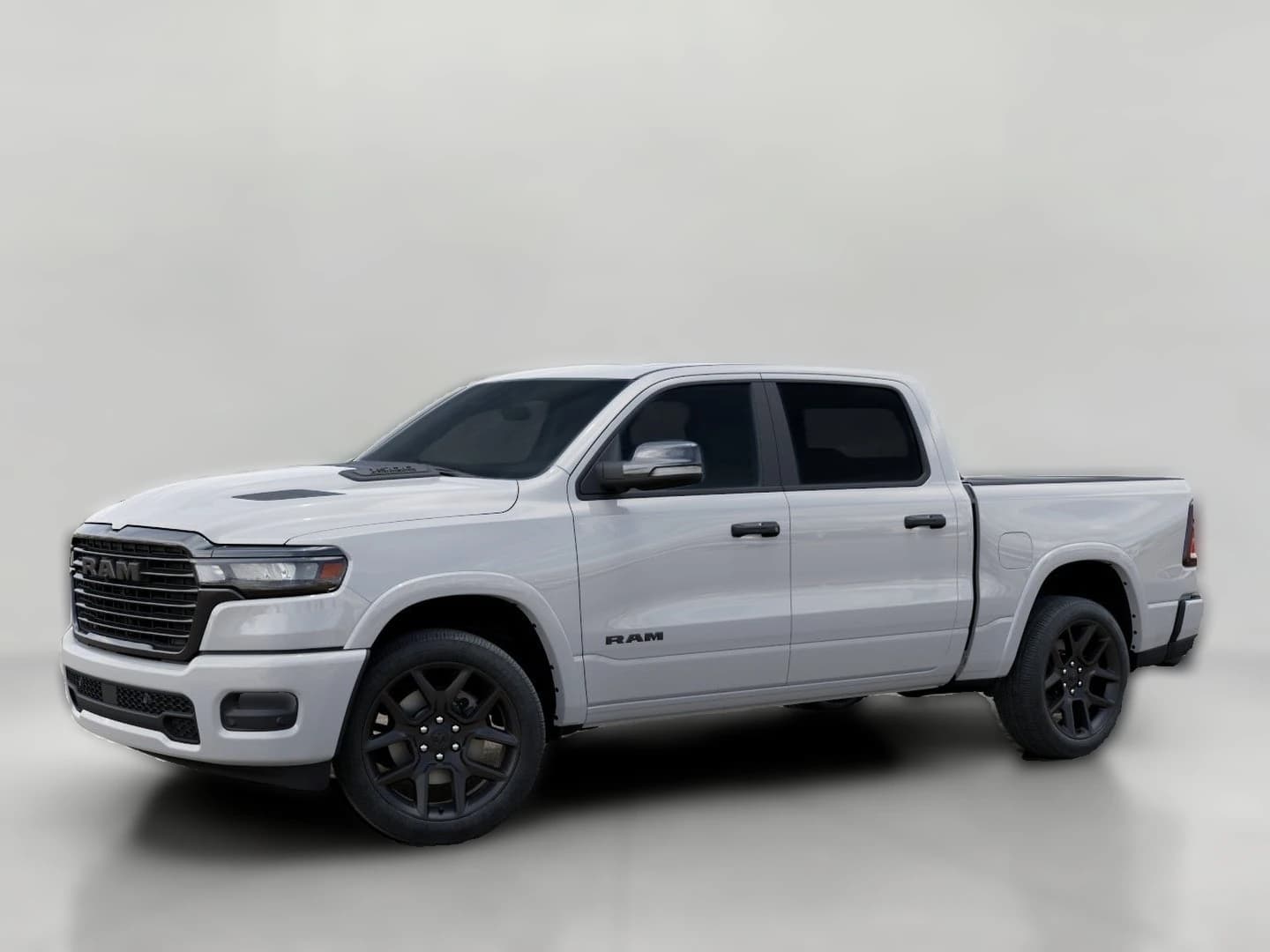 Ram 1500 Laramie 4x4 Crew Cab 5'7" Box 2026 — side view