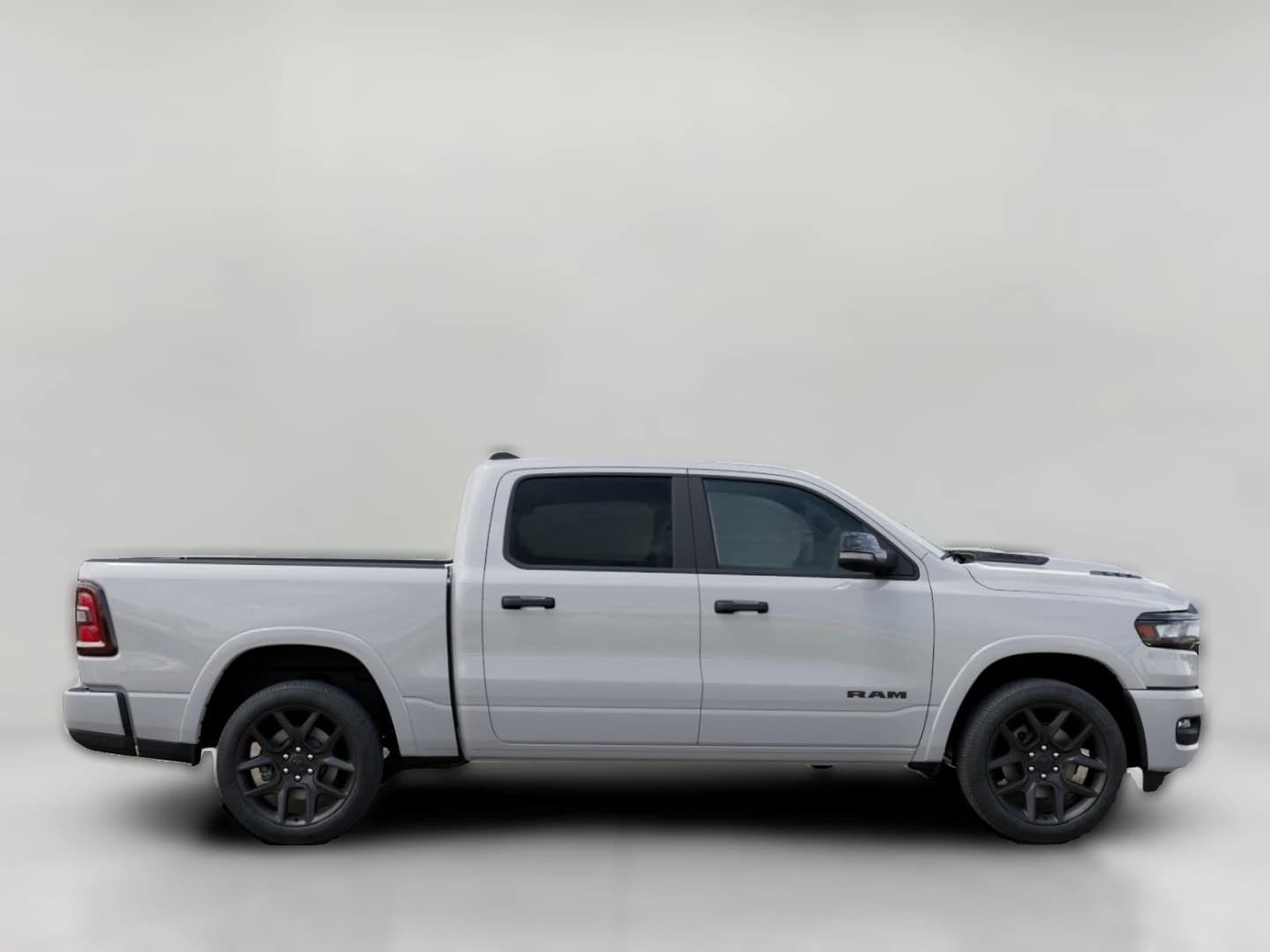 Ram 1500 Laramie 4x4 Crew Cab 5'7" Box 2026 — side view