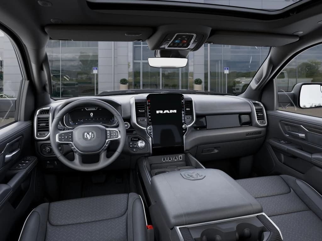 Ram 1500 Laramie 4x4 Crew Cab 5'7" Box 2026 — side view