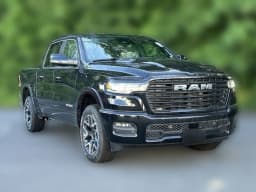 Ram 1500 Laramie 4x4 Crew Cab 5'7" Box 2026 — side view