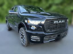 Ram 1500 Laramie 4x4 Crew Cab 5'7" Box 2026 — side view