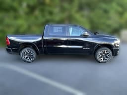 Ram 1500 Laramie 4x4 Crew Cab 5'7" Box 2026 — side view