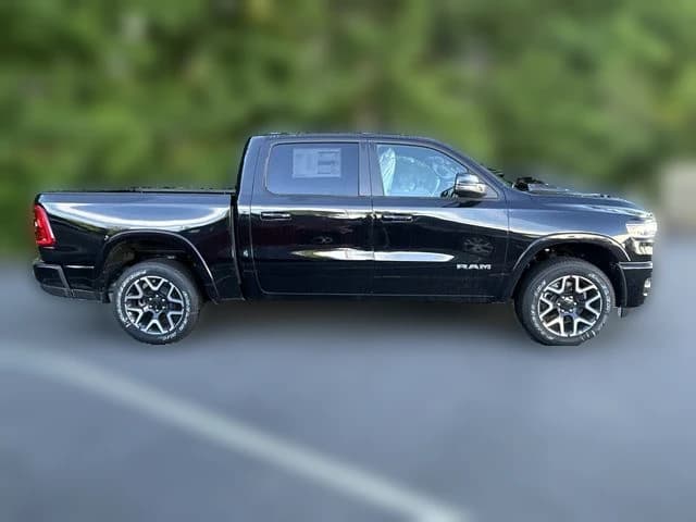 Ram 1500 Laramie 4x4 Crew Cab 5'7" Box 2026 — side view