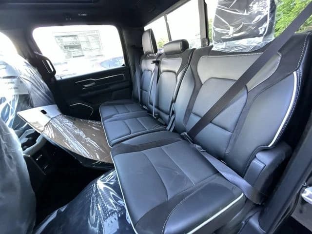 Ram 1500 Laramie 4x4 Crew Cab 5'7" Box 2026 — side view