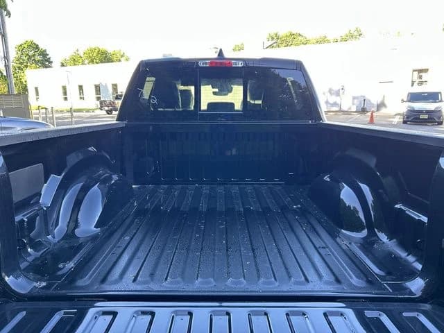 Ram 1500 Laramie 4x4 Crew Cab 5'7" Box 2026 — side view