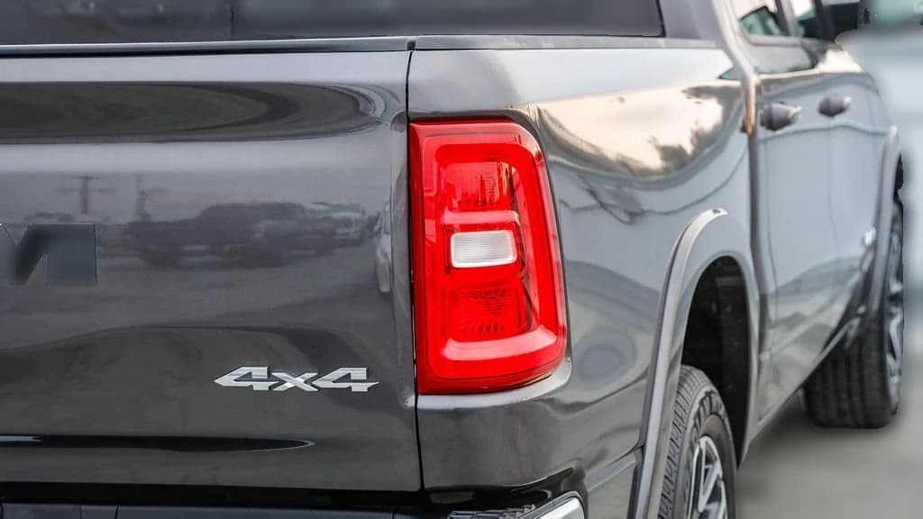 Ram 1500 Laramie 4x4 Crew Cab 5'7" Box 2026 — side view