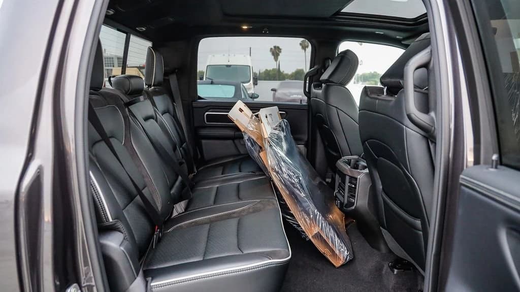 Ram 1500 Laramie 4x4 Crew Cab 5'7" Box 2026 — side view