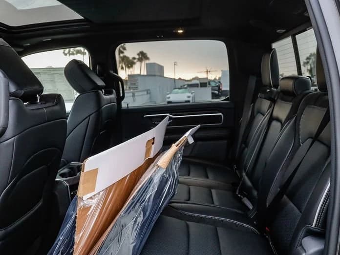 Ram 1500 Laramie 4x4 Crew Cab 5'7" Box 2026 — side view