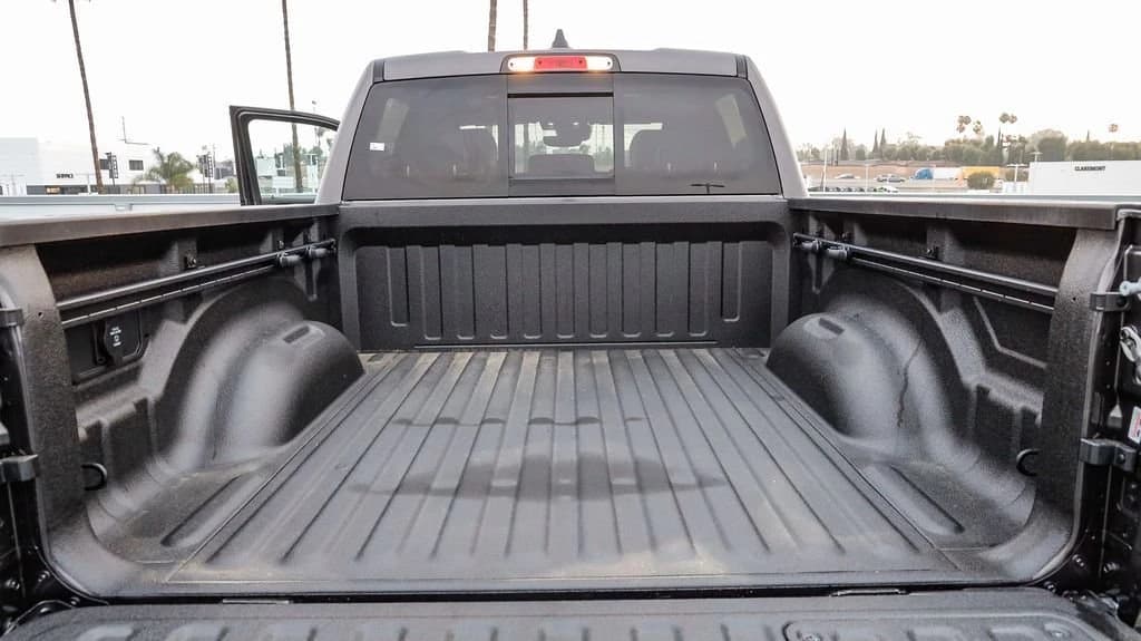 Ram 1500 Laramie 4x4 Crew Cab 5'7" Box 2026 — side view