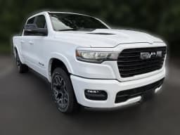 Ram 1500 Laramie 4x4 Crew Cab 5'7" Box 2026 — side view