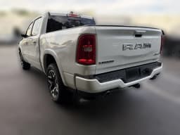 Ram 1500 Laramie 4x4 Crew Cab 5'7" Box 2026 — side view