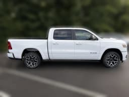 Ram 1500 Laramie 4x4 Crew Cab 5'7" Box 2026 — side view
