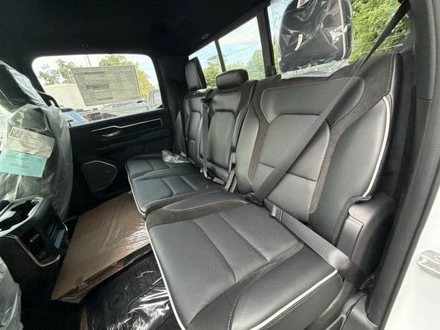 Ram 1500 Laramie 4x4 Crew Cab 5'7" Box 2026 — side view