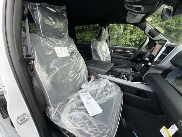 Ram 1500 Laramie 4x4 Crew Cab 5'7" Box 2026 — side view