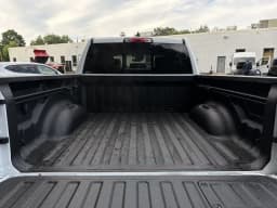 Ram 1500 Laramie 4x4 Crew Cab 5'7" Box 2026 — side view