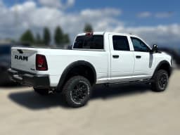 Ram 2500 Tradesman 4x4 Crew Cab 6'4" Box 2026 — side view