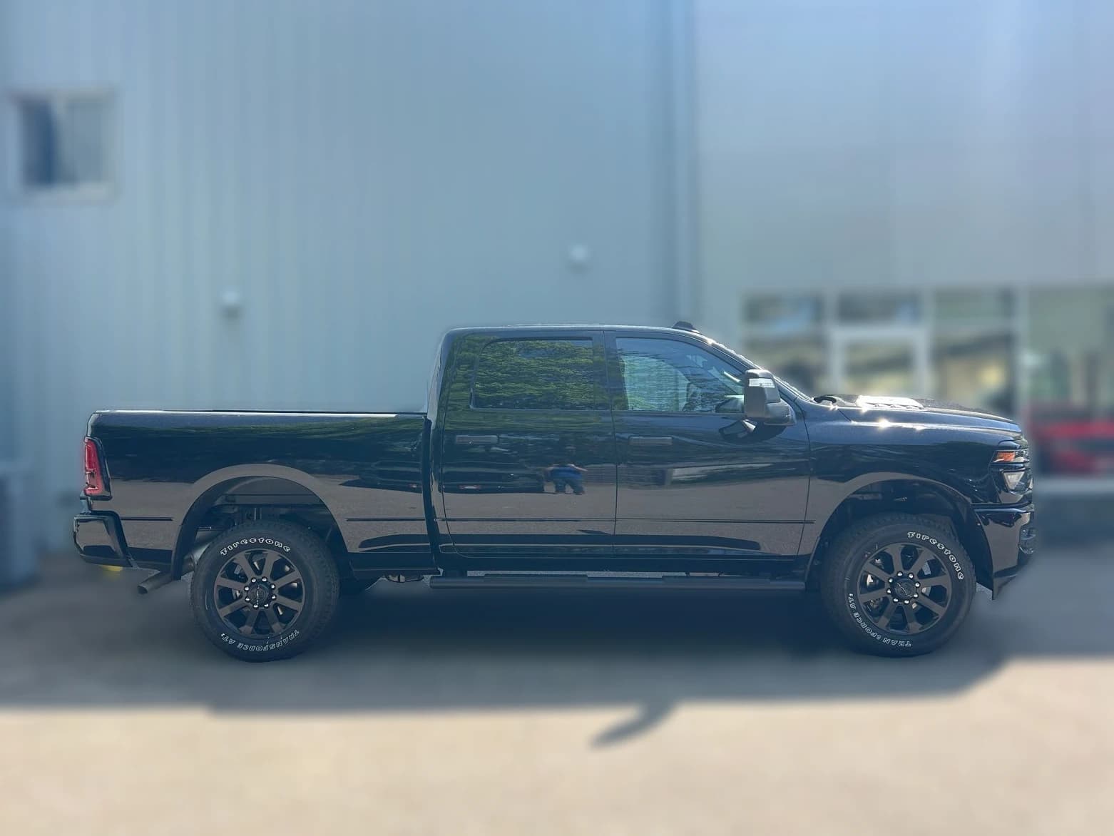 Ram 2500 Black Express 4x4 Crew Cab 6'4" Box 2026 — side view