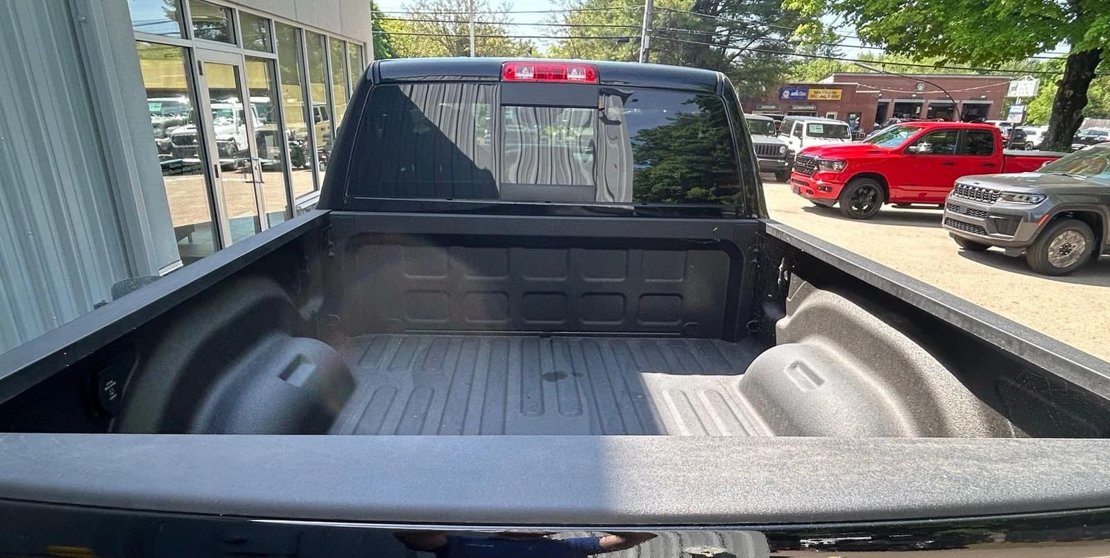 Ram 2500 Black Express 4x4 Crew Cab 6'4" Box 2026 — side view