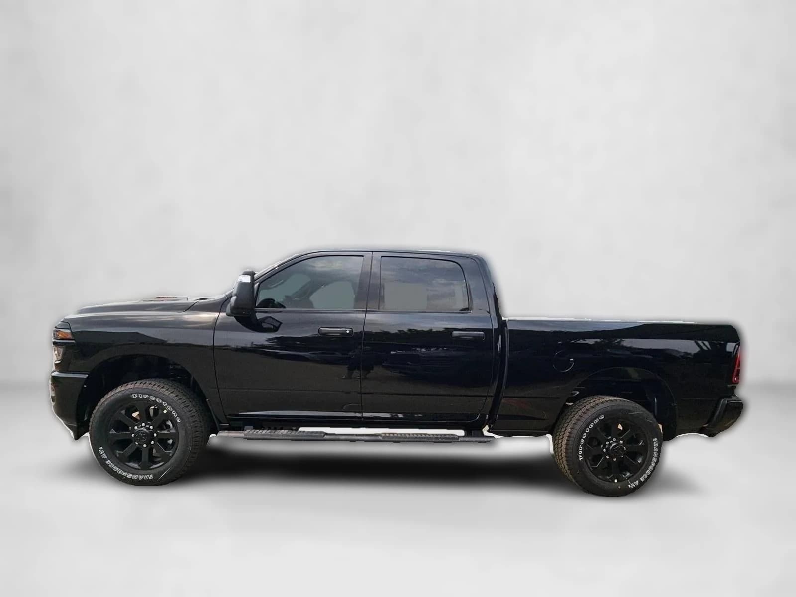 Ram 2500 Black Express 4x4 Crew Cab 6'4" Box 2026 — side view