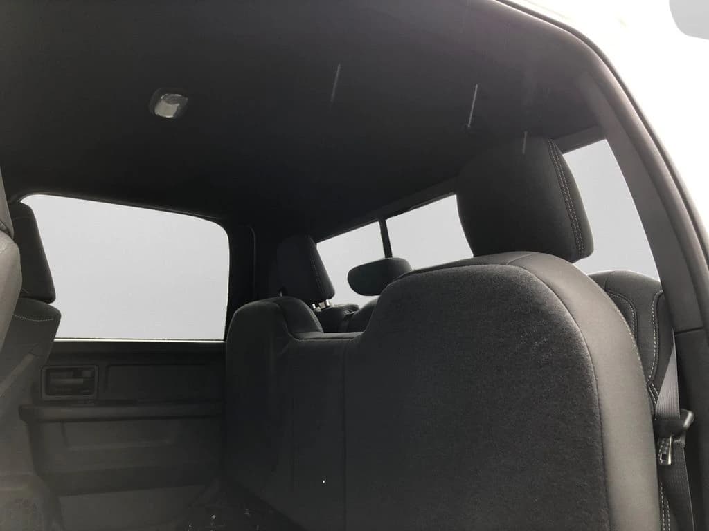Ram 2500 Black Express 4x4 Crew Cab 6'4" Box 2026 — side view