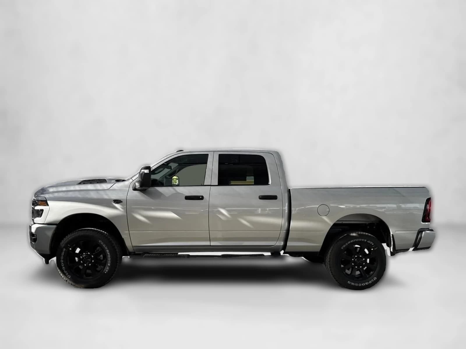 Ram 2500 Tradesman 4x4 Crew Cab 6'4" Box 2027 — side view