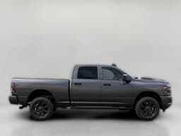 Ram 2500 Black Express 4x4 Crew Cab 6'4" Box 2027 — side view