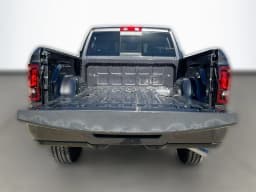 Ram 2500 Black Express 4x4 Crew Cab 6'4" Box 2026 — side view