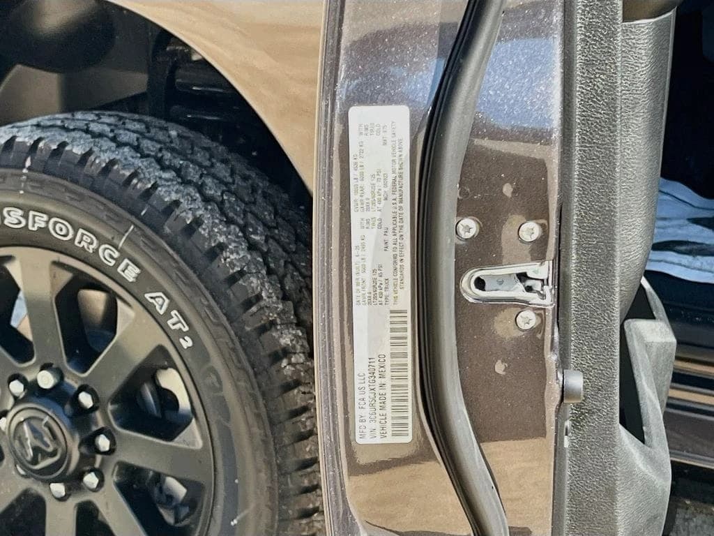 Ram 2500 Black Express 4x4 Crew Cab 6'4" Box 2026 — side view