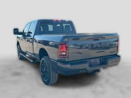 Ram 2500 Black Express 4x4 Crew Cab 6'4" Box 2027 — side view