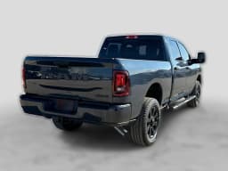 Ram 2500 Black Express 4x4 Crew Cab 6'4" Box 2027 — side view