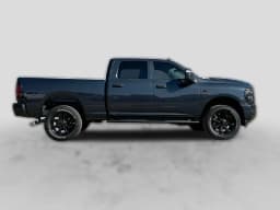 Ram 2500 Black Express 4x4 Crew Cab 6'4" Box 2027 — side view