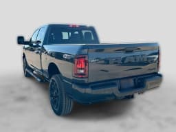 Ram 2500 Black Express 4x4 Crew Cab 6'4" Box 2027 — side view