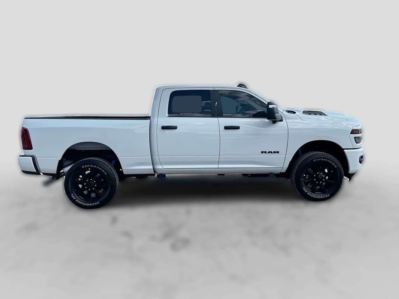 Ram 2500 Big Horn 4x4 Crew Cab 6'4" Box 2026 — side view