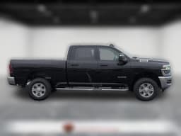 Ram 2500 Big Horn 4x4 Crew Cab 6'4" Box 2026 — side view