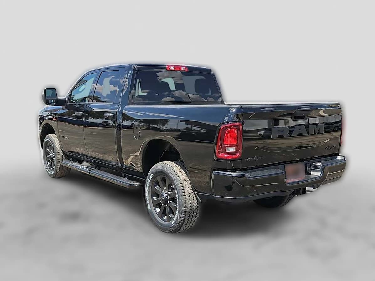 Ram 2500 Lone Star 4x4 Crew Cab 6'4" Box 2027 — side view