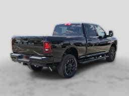 Ram 2500 Lone Star 4x4 Crew Cab 6'4" Box 2027 — side view